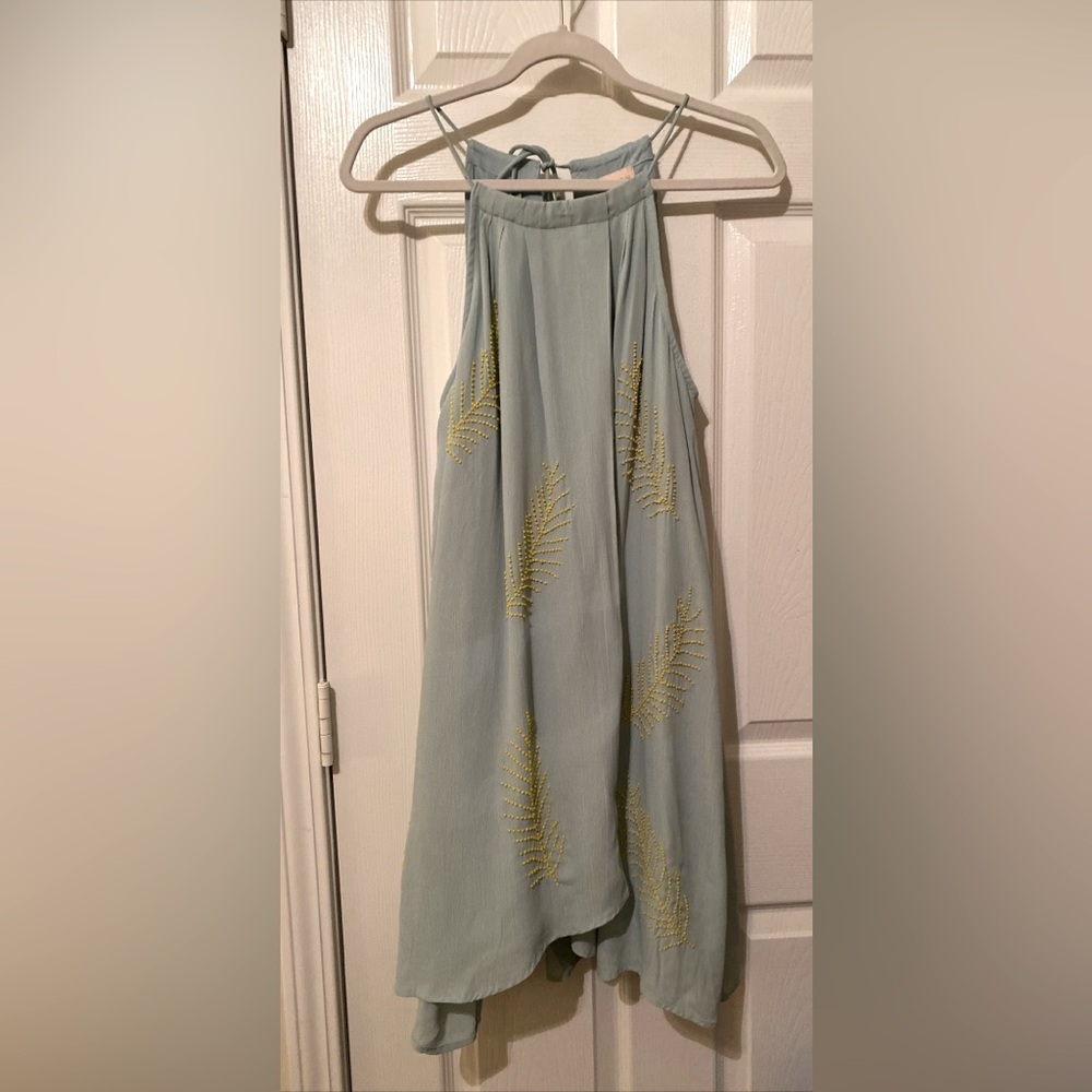 Ciebon dress
Light Blue Sleeveless Dress with Yellow Accents